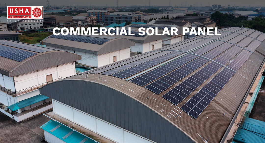 Commercial solar panels installed on industrial warehouse rooftop for large-scale business electricity generation